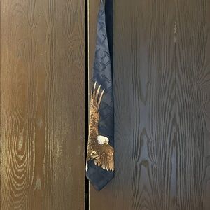 Wembley men’s navy blue tie with the American eagle.